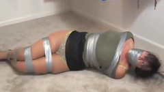 Milf gets tied and gagged at home with ductape