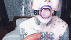 tattooed sloppy deepthroat with spider gag and lots of drool